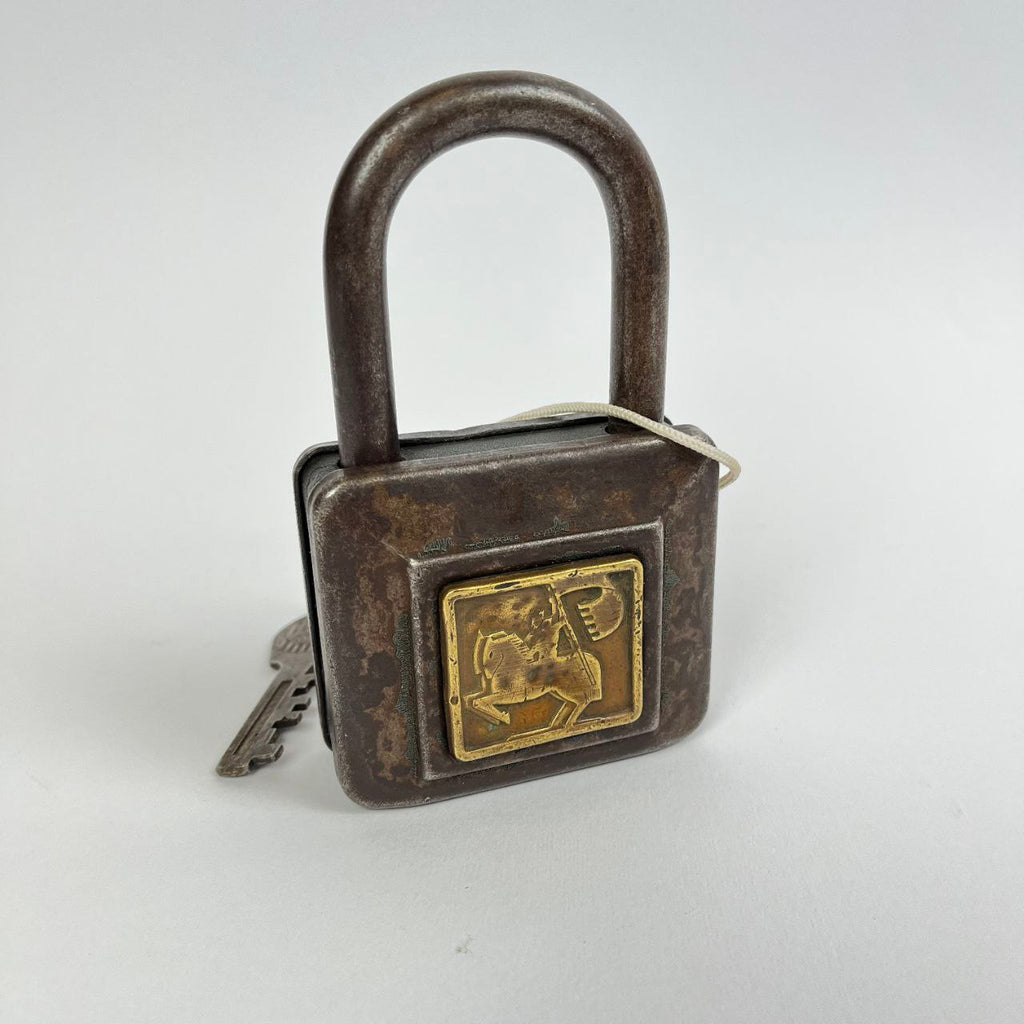 Lucchetto in ferro con decorazione in ottone