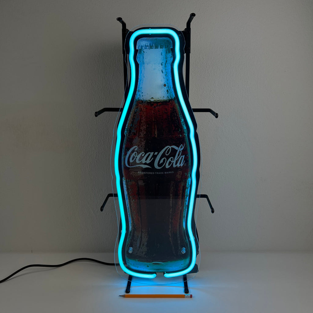 Insegna luminosa Coca-Cola a forma di bottiglia
