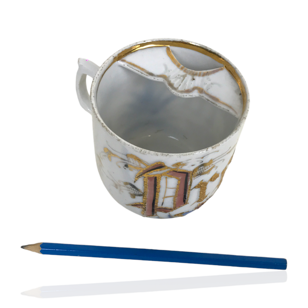 Porcelain moustache cup