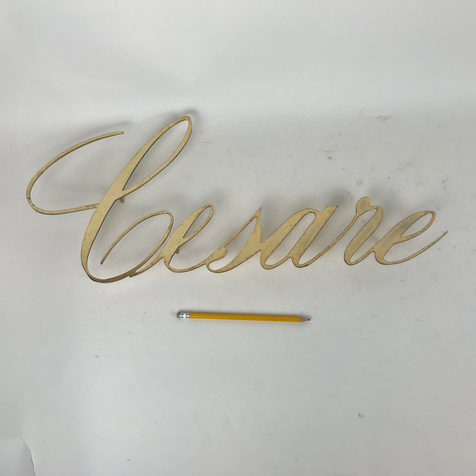 Brass sign - Caesar
