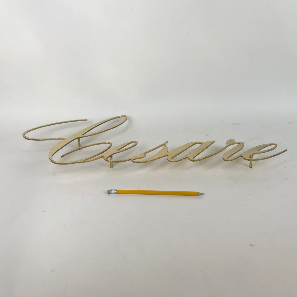 Brass sign - Caesar