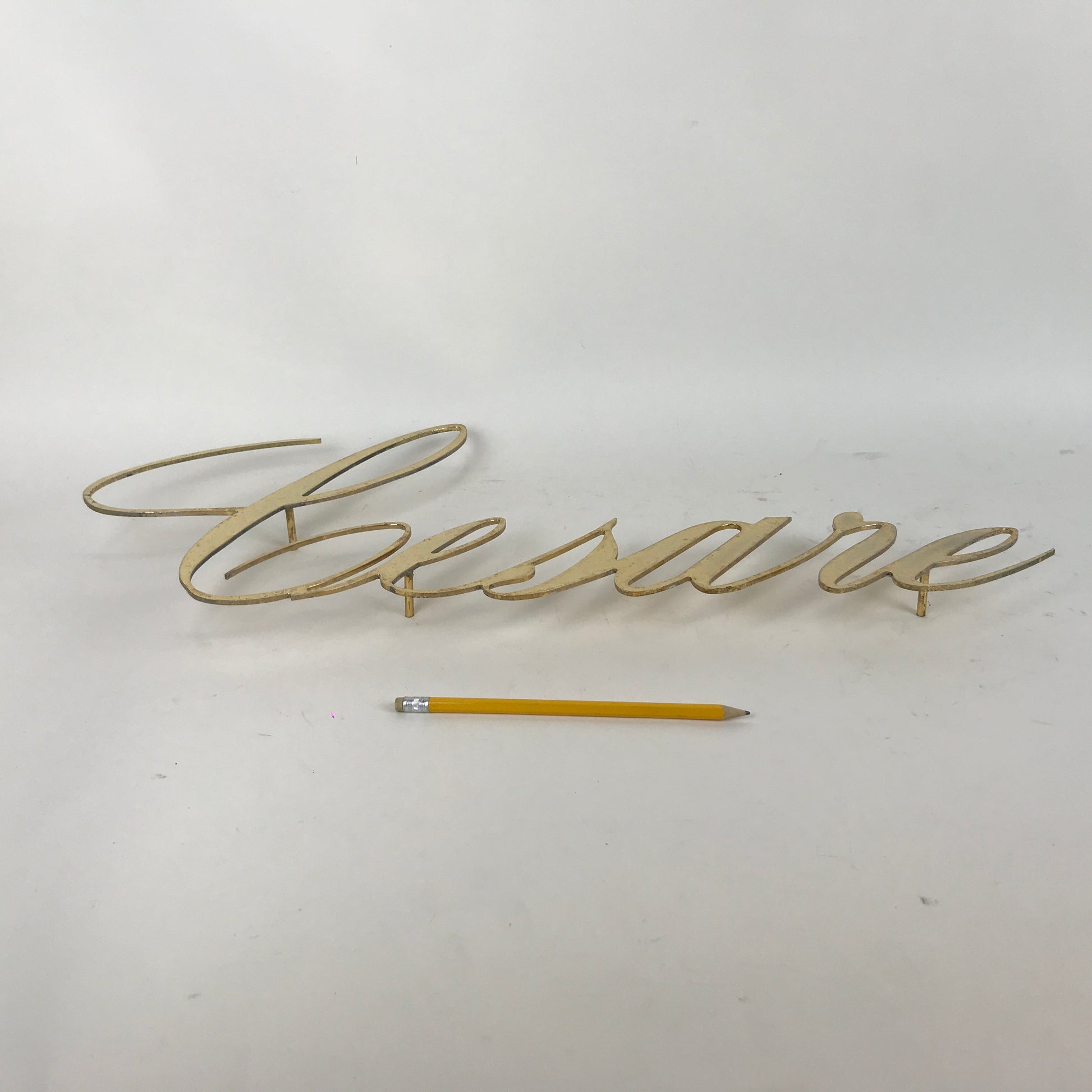 Brass sign - Caesar