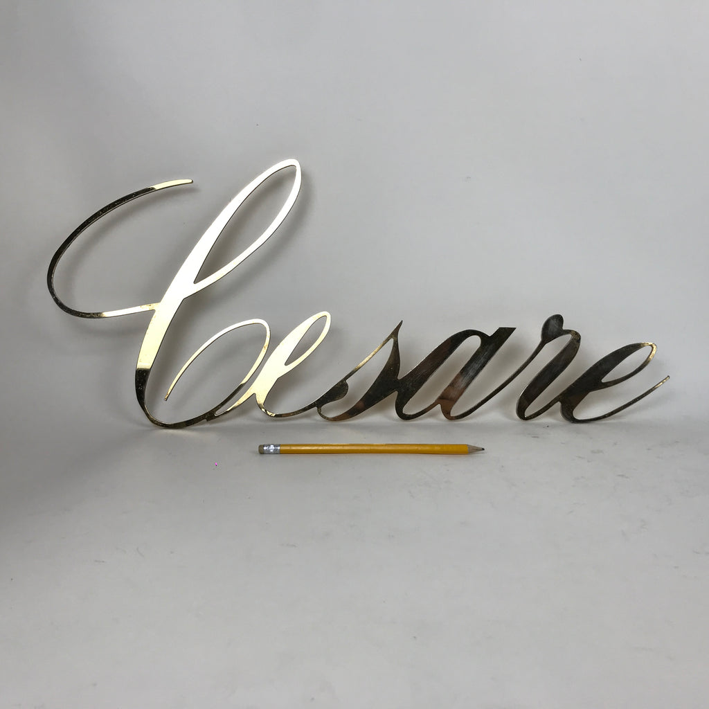 Brass sign - Caesar