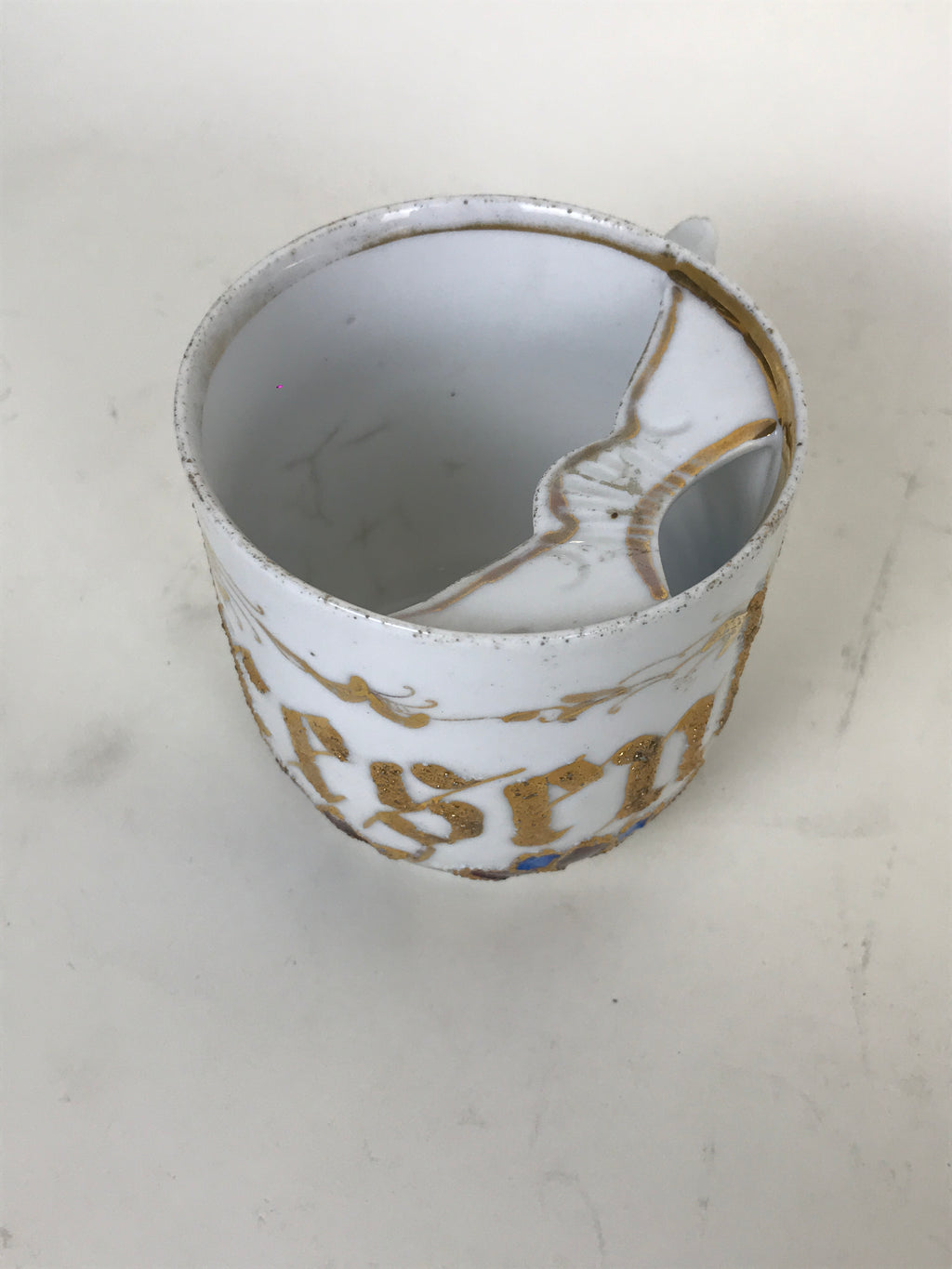 Porcelain moustache cup