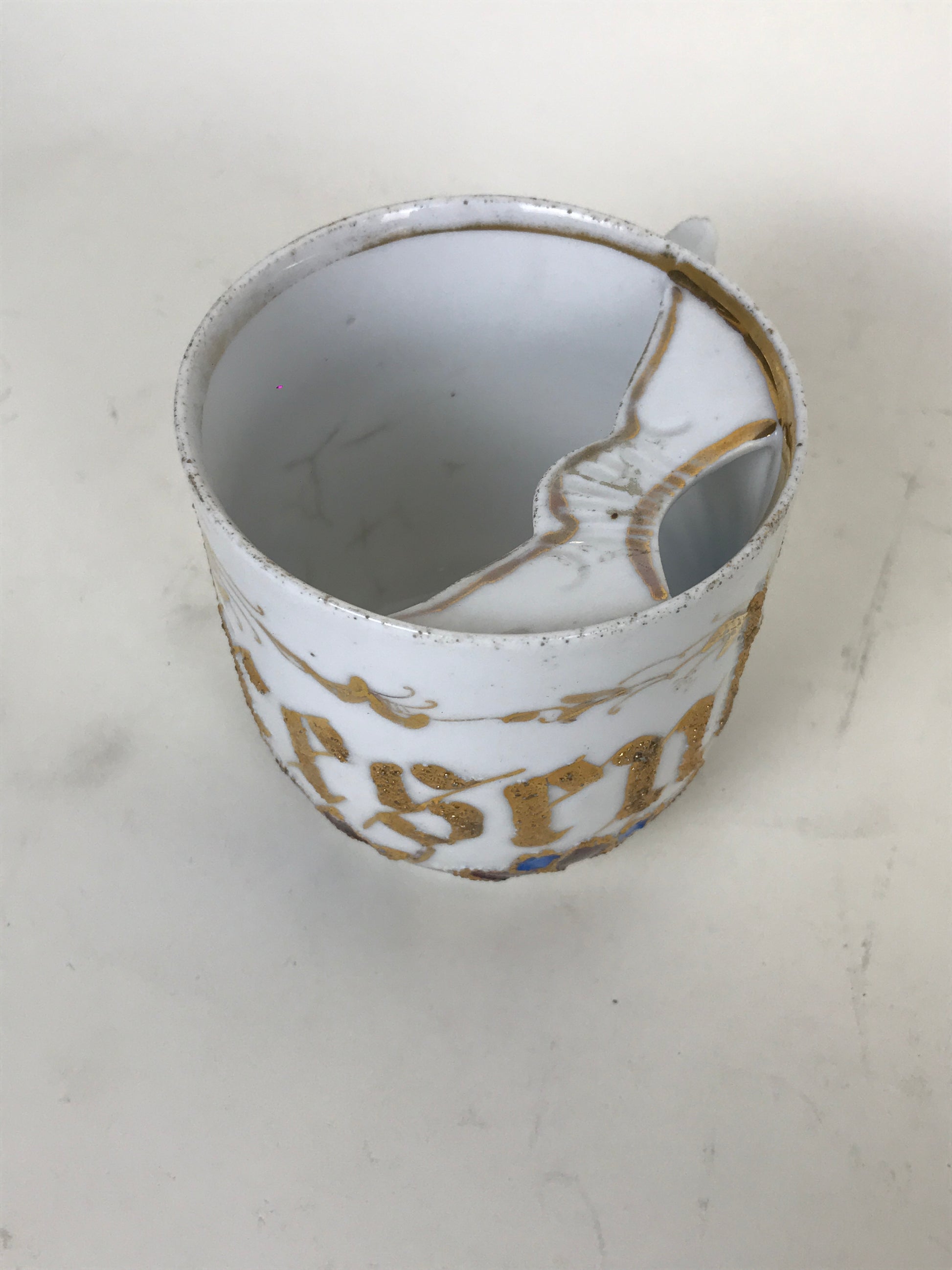 Porcelain moustache cup
