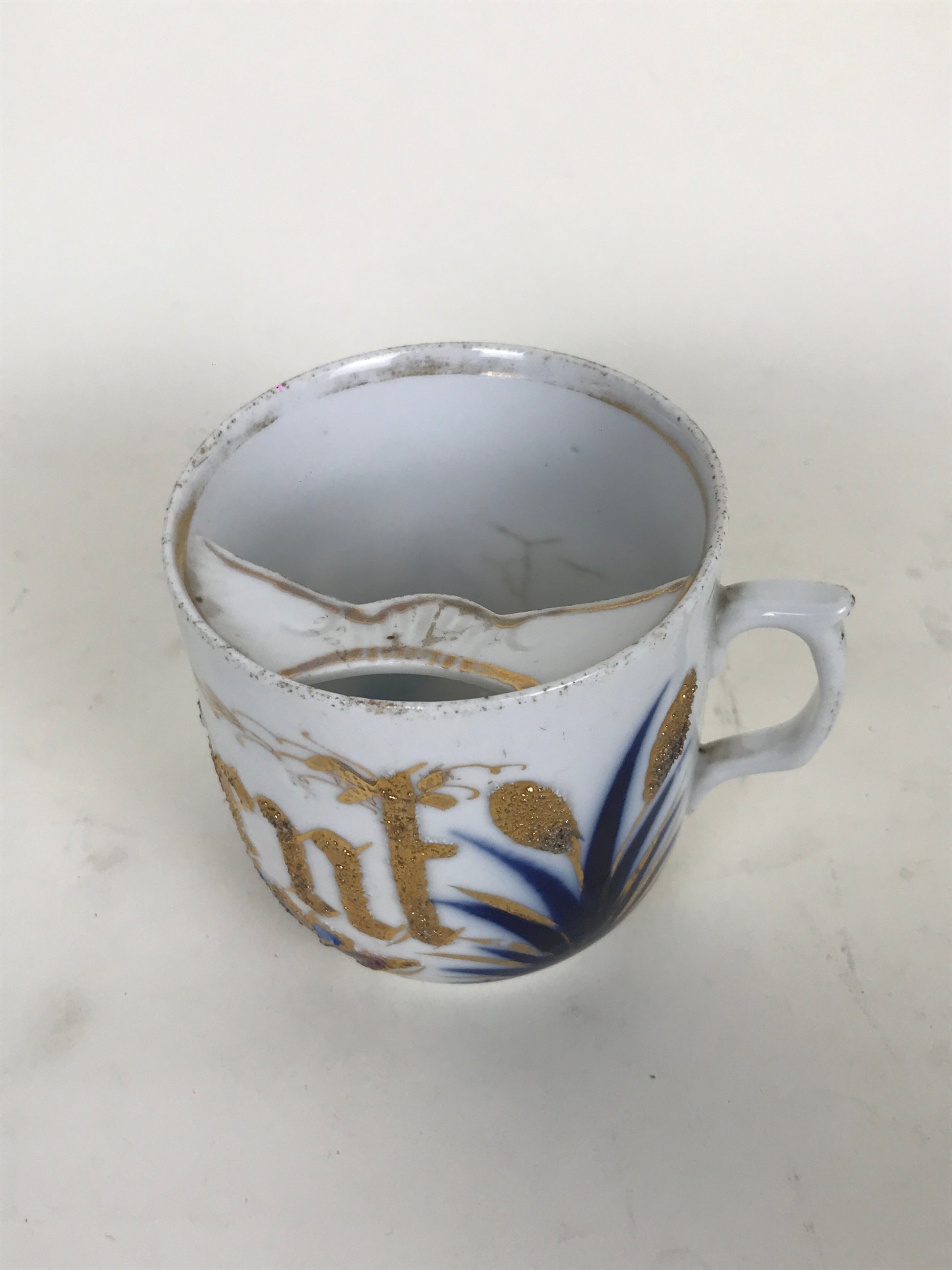 Porcelain moustache cup