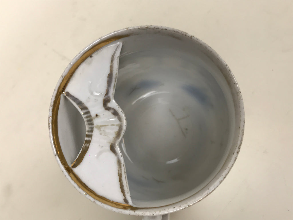 Porcelain moustache cup