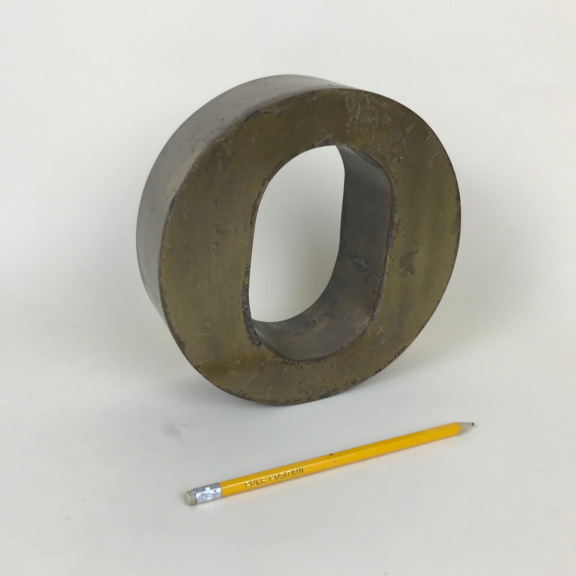 Sign - brass letter "O"