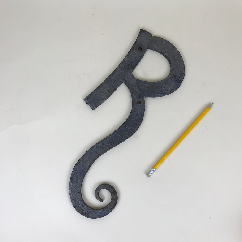 Wrought iron "R" sign | 1980s