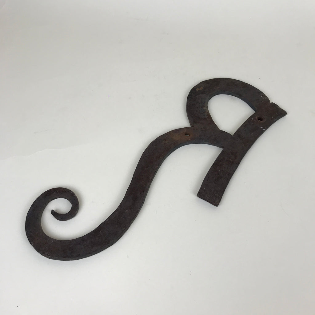 Wrought iron "R" sign | 1980s